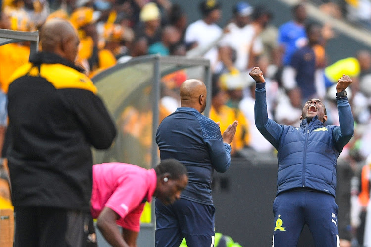 Mamelodi Sundowns coach Rulani Mokwena celebrates Khuliso Mudau’s goal while Kaizer Chiefs coach Molefi Ntseki looks on during their MTN8 semi final, 1st leg match on Sunday