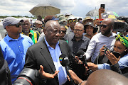 ANC president Cyril Ramaphosa engages with the media after laying a wreath at the gravesite of former ANC president Zaccheus Mahabane in Maokeng, in the Free State.