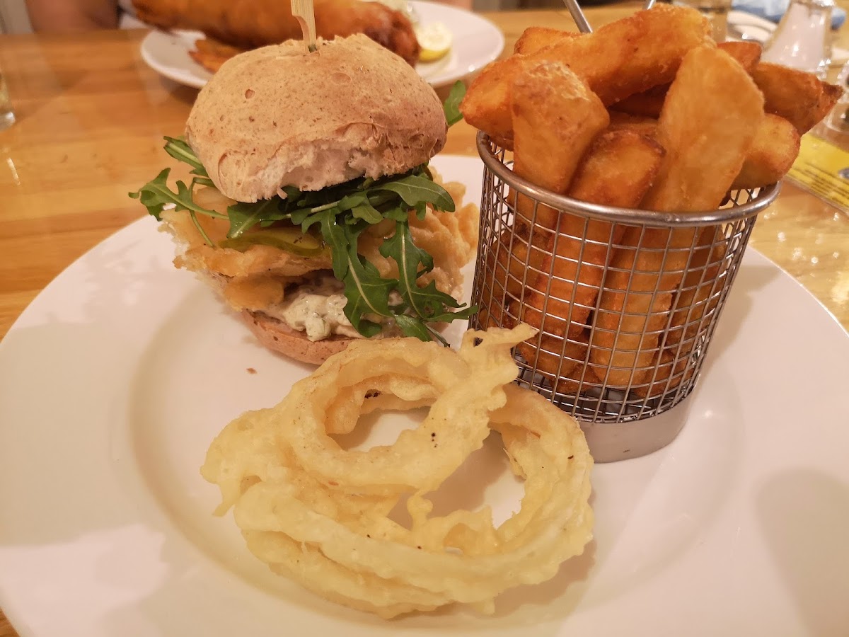 battered fish burger,chips and onion rings. All gluten free