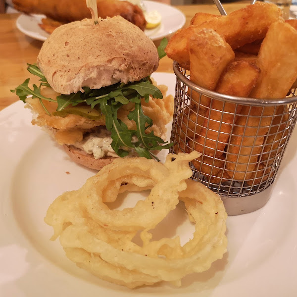 battered fish burger,chips and onion rings. All gluten free