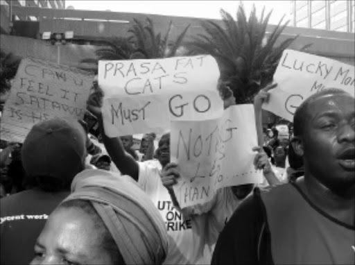 CLEAR MESSAGE: Striking workers besiege Parliament in Cape town yesterday to hand over a memorandum to Transport Minister Sbu Ndebele to break the deadlock between employers and employees to bring an end to strike. Pic: ANNA MAJAVU. 18/05/2010. © Sowetan.