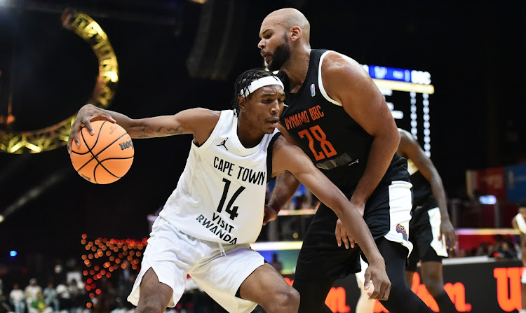 Nkosinathi Sibanyoni of Cape Town Tigers is challenged by Morakinyo Williams of Dynamo BBC in their 2024 Baskeball Africa League Season 4 match at the SunBet Arena in Pretoria on Saturday.