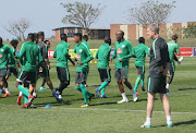 Stuart Baxter watches as his Bafana Bafana players go through their paces during the SA senior national men's soccer team training session at Princess Magogo Stadium in KwaMashu, Durban, on September 04, 2018.