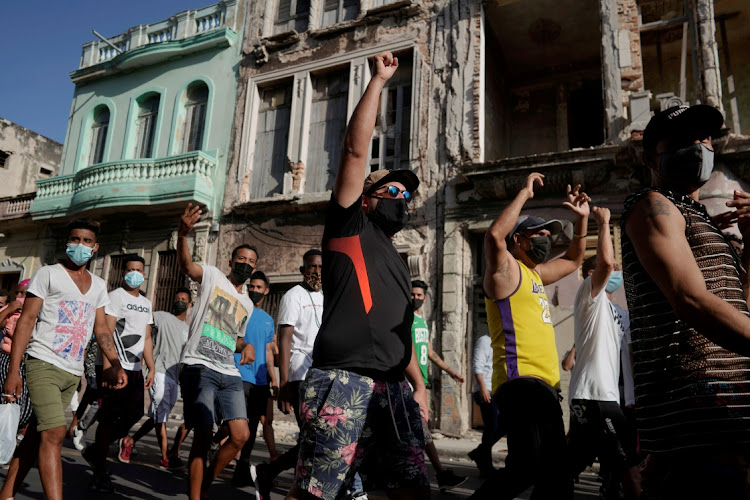 People shout slogans against the government during a protest against and in support of the government, amidst the coronavirus disease (Covid-19) outbreak, in Havana, Cuba July 11, 2021.