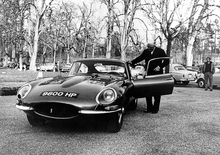 Jaguar founder Sir William Lyons with the 9600HP at the E-Type’s 1961 world debut in Geneva.