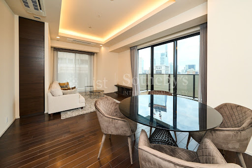 Living room with city view - Buy this luxury property in Minato City, 2 bedrooms