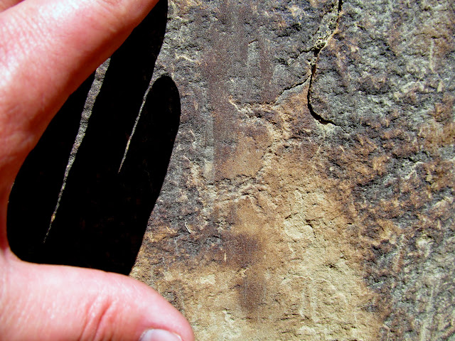 Very tiny bighorn sheep petroglyph