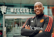 Benni McCarthy at Old Trafford after signing as a first team coach for Manchester United.