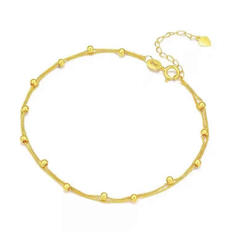 Pulseira Estrela de Pérolas Dupla Camada Ouro 18K. Adicione sofisticação e brilho ao seu visual com este acessório elegante e atemporal.