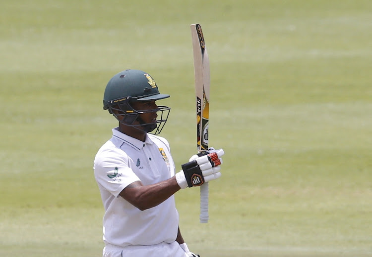 Proteas batter Keegan Petersen celebrates reaching his half-century.