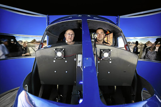 French finance minister Michel Sapin, left, is given a guided tour by test pilot Greg Jonsson. Sapin was visiting Airbus Helicopters at Grand Central Airport in Midrand on Friday. The purpose of his two-day visit was to strengthen economic relations between France and South Africa.