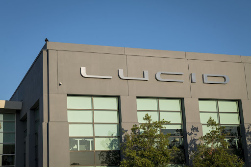 Lucid Group Inc. lowered its production target for 2022 to a range of 12,000 to 14,000 cars, down from a previous goal of 20,000 for the year, citing “extraordinary” challenges with logistics and its supply chain.