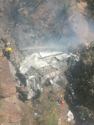 Firefighters at the scene of a bus crash on the R518 in the Waterberg district in Limpopo on Thursday. 