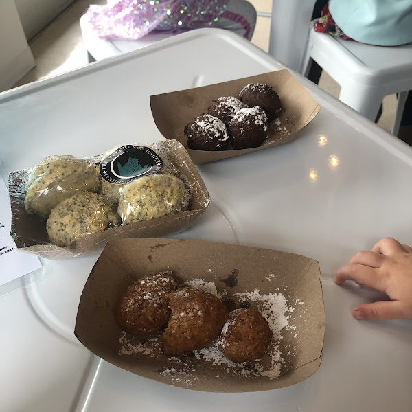 The fried donut holes are served hot and fresh! Don’t ever pass up the chance to have them because they are amazing! The packaged goods are lemon chia scones to bake at home.