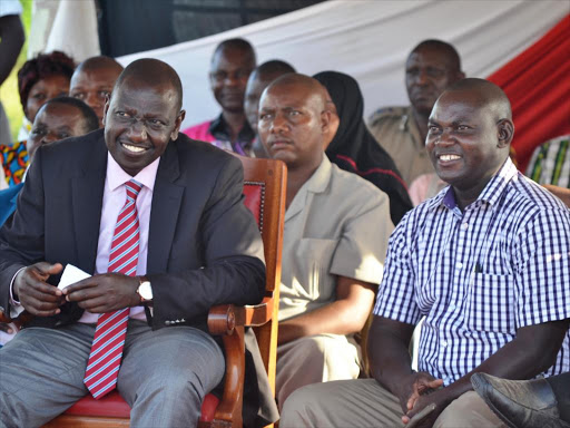 WATCH SPENDING: Deputy President William Ruto and Kaloleni MP Gunga Mwinga during a funds drive at Kirumbi Girls High School in Kaloleni last November 1.