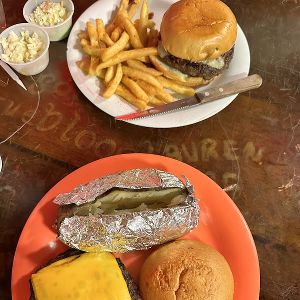 Orange plate is GF bun, white plate is not