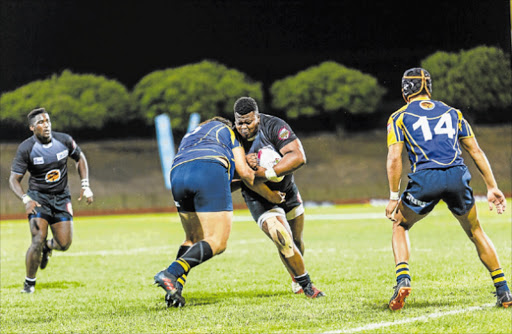 ON THE DRIVE: FNB WSU captain Phumlani Blaauw, with ball in hand, charges through against FNB UWC in the FNB Varsity Shield final Picture: KEVIN SAWYER