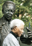 Nelson Mandela at the unveiling of his statue in Trafalgar Square, London, in 2007. File photo