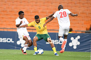 Lyle Foster of South Africa and Mcolisi Mananaphilani Mkhontfo of Eswatini during the international friendly at FNB Stadium on October 13 2023 in Johannesburg. 