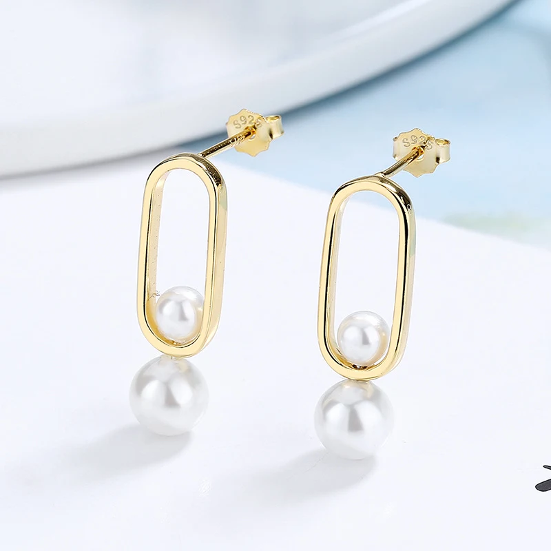 Boucles d'oreilles perles de mode en argent sterling S925, un accessoire féminin et élégant pour toutes les occasions, sublimant votre look.