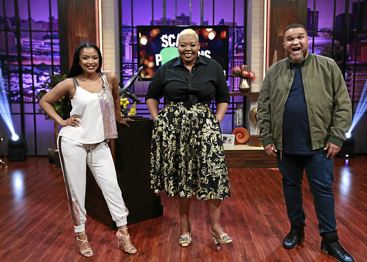 Host of 'Celebrity Game Night' Anele Mdoda (centre), with team captains Ayanda Thabethe and Jason Goliath.