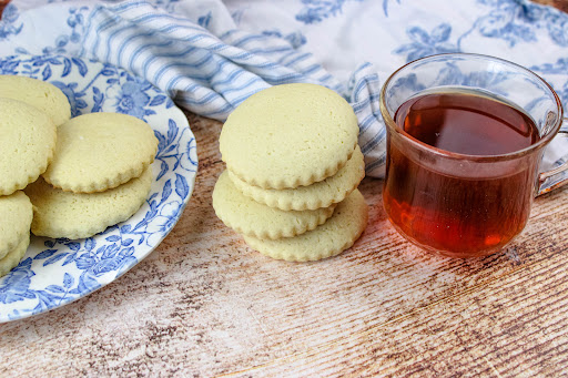 Granny's Old-Fashion Tea Cakes with a cup of tea.