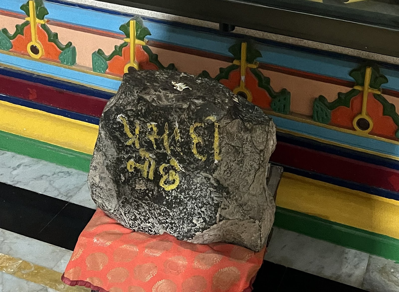 Stone upon which Shree Hari would sit to bathe