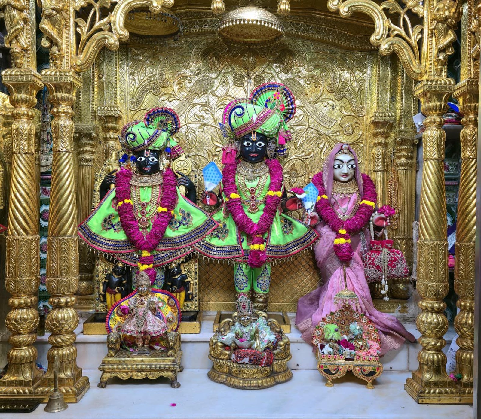 Vasudev Narayan alongside Shree Dharmadev and Bhaktimata in the main mandir