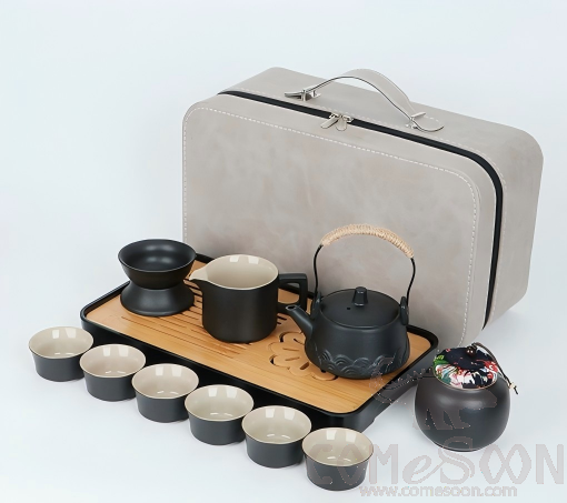 Black pottery handle teapot set, grey leather bag
