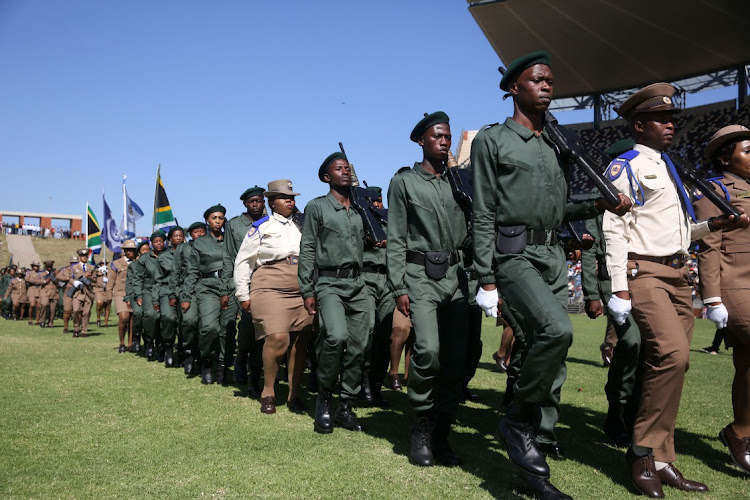 Crime prevention wardens on a parade at the Giant Stadium in Soshanguve in April. They paraded with members of the Gauteng traffic police. File photo.