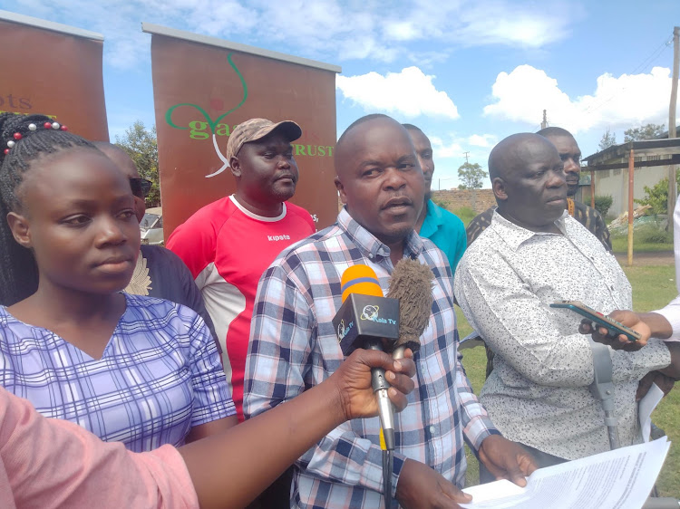 Grassroots Trust for community organisation coordinator Lawrence Apiyo during a press briefing ahead of housing festival in Kisumu on Friday.