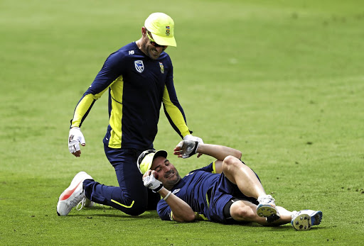 South Africa's Faf du Plessis and Dean Elgar share a light moment at training ahead of the second Test against England at Trent Bridge in Nottingham.