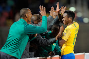 Themba Zwane of Mamelodi Sundowns celebrating his goal with his team mates during the Absa Premiership match between Bloemfontein Celtic and Mamelodi Sundowns at Dr Moelema Stadium on August 28, 2019 in Bloemfontein, South Africa. 