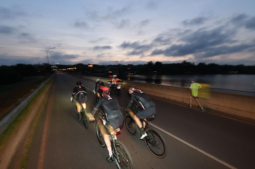 Dawn cyclists joining the memorial ride for Alex Otto.