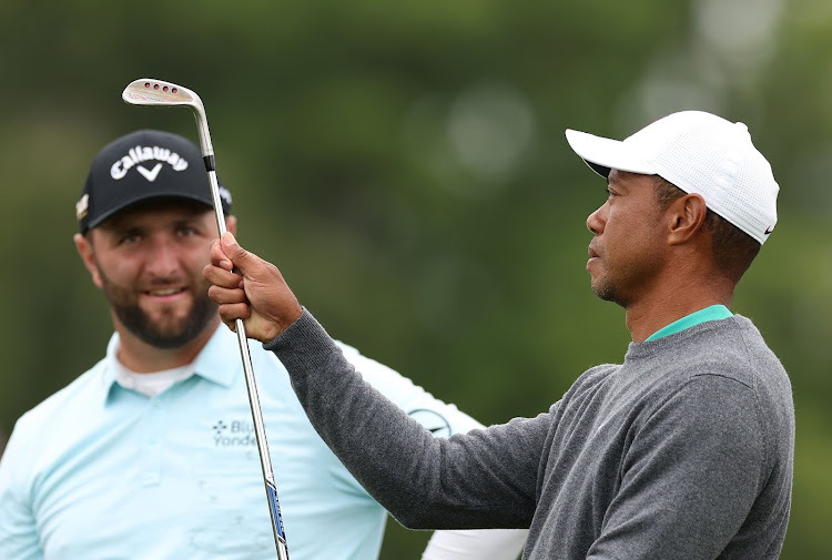 Tiger Woods, right, and Jon Rahm chat during day two of the JP McManus Pro-Am at Adare Manor in Limerick, Ireland, on Tuesday. Picture: OISIN KENIRY/GETTY IMAGES