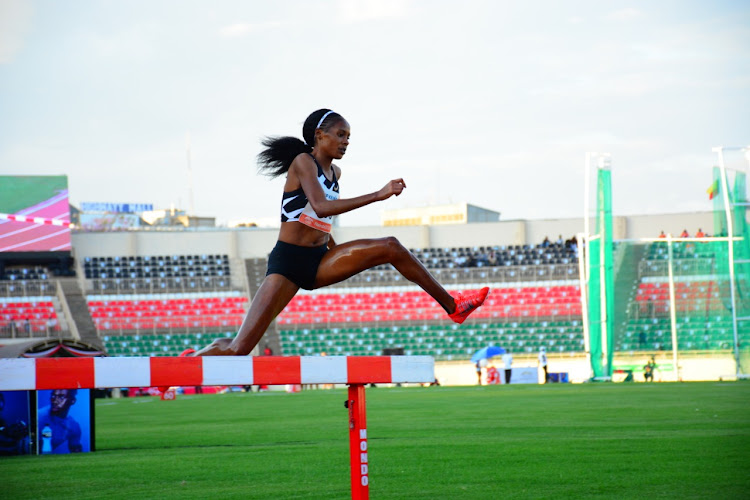 Beatrice Chepkoech clears the hurdle in a past championship.