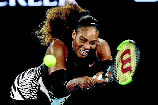 Serena Williams of the US hits a return against Lucie Safarova during their second round match of the Australian Open yesterday. PHOTO: PAUL CROCK/afp