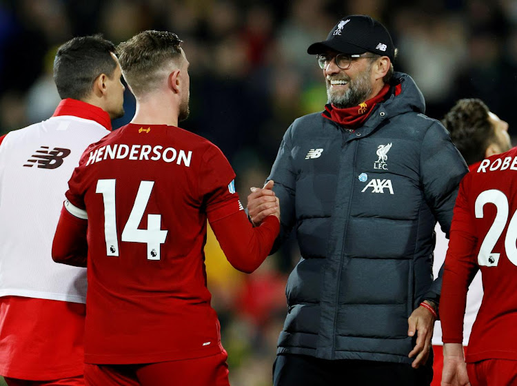 Liverpool manager Jurgen Klopp with captain Jordan Henderson