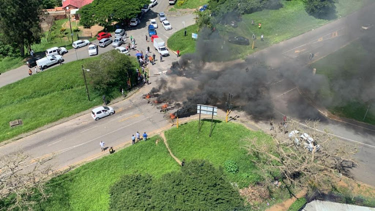 Angry residents burned debris and tyres at the intersection of Parkgate and Ottawa in protest against weeks of going without water. The SAHRC is meeting with city officials about the issues. File photo.