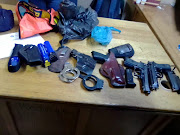 Police are investigating after an assortment of weapons and ammunition was found early on Sunday, in the unoccupied doctors' quarters of Baragwanath hospital in Soweto.