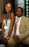 South African sports presenter Robert Marawa with Pop stars finalist Zoe Mthiyane in this 2004 file photo in Johannesburg, South Africa.