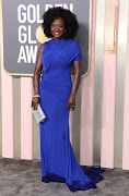 Viola Davis looking gorgeous on the 80th Annual Golden Globe Awards grey carpet. 