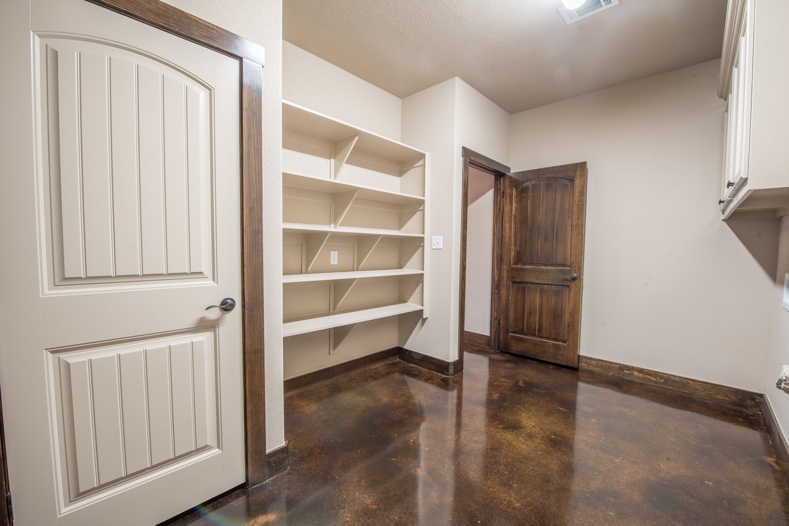 laundry room of Metal Home by HL Custom Homes