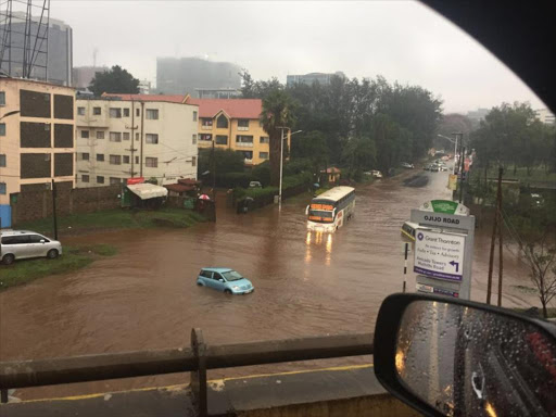 Vehicles on a flooded street in Nairobi on March 15, 2018.