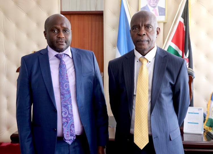 Makueni County's new Chief of Staff Justus Kaminda Kisilu with Governor Kivutha Kibwana.