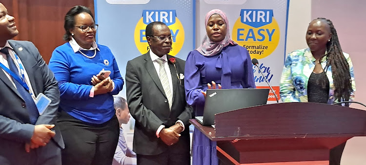 Dr Aminah Zawedde the permanent secretary ministry of ICT officiates at the launch of the online business registration platform,an initiative of the URSB.