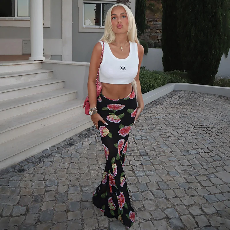 Jupe fourreau en maille imprimée taille basse été 2024 pour femme, parfaite pour un look estival élégant et confortable.