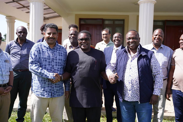 Businessman Abdulwalli Shariff Ahmed with Bungoma Governor Ken Lusaka and KNCCI president Richard Ngatia in Bungoma on Saturday, May 27, 2023