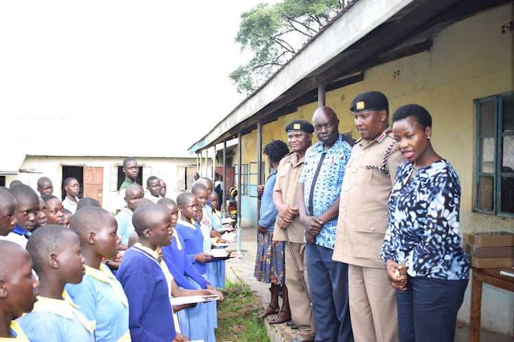 The PS at Kakurikit Primary School on October 30, 2023. She is with county commissioner Kipchumba Ruto, Teso North DCC Stephen Wambura and Kakurikit primary school head Wilson Emojong.