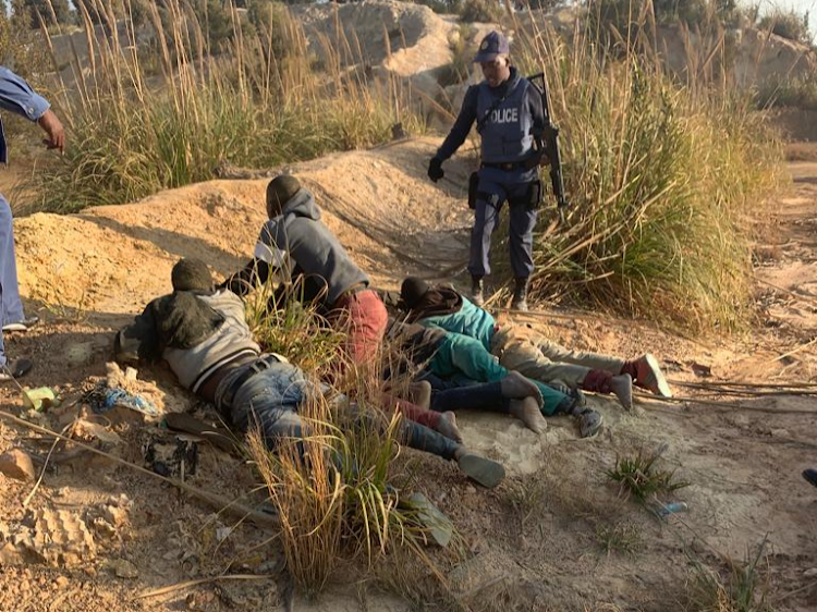 A film crew was apparently shooting a music video when a gang of informal miners in Basotho blankets stormed the scene, fired guns and raped the models.